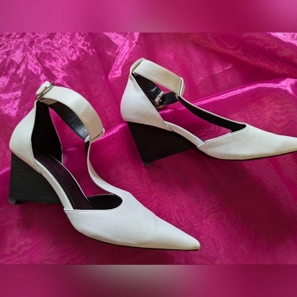 Sculptural white T-strap heels
